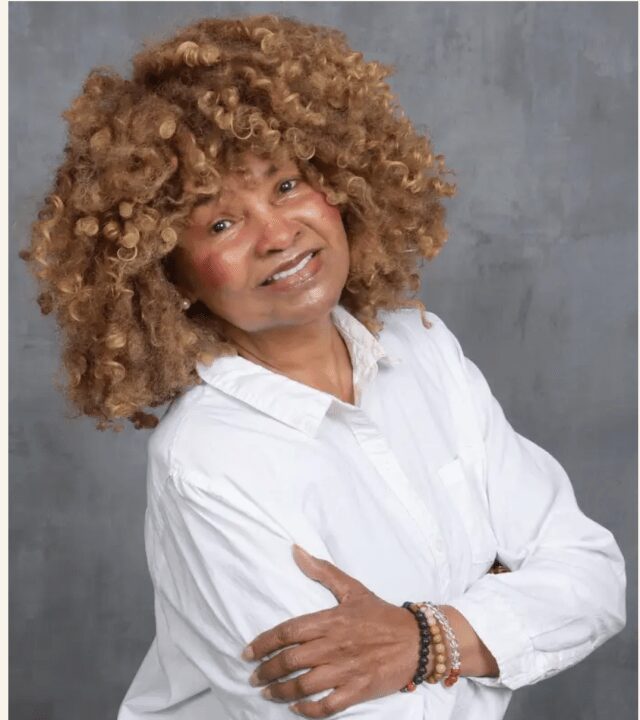 closeup of a woman with curly hair